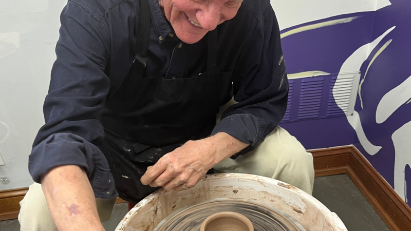 Man Wheel Throwing a ceramic 